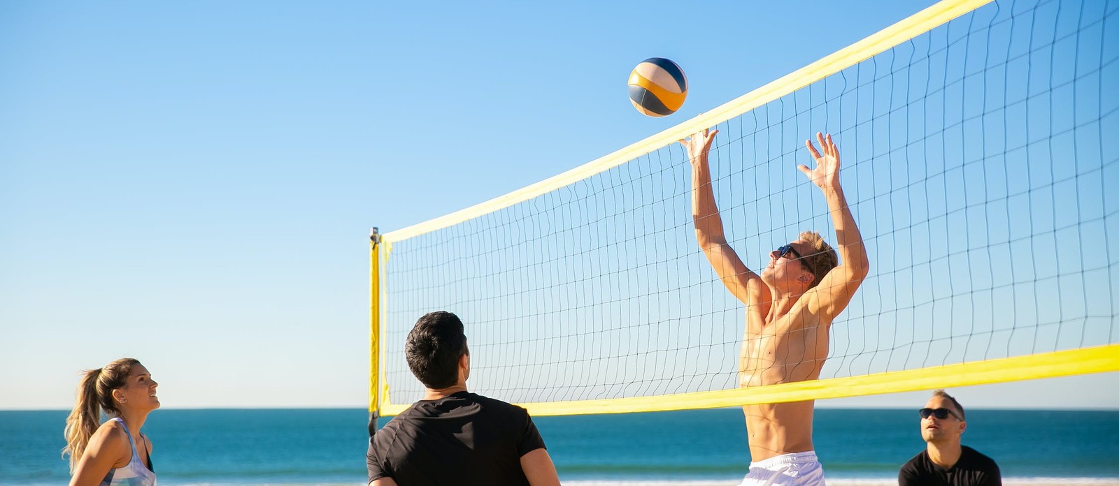 Volleyball was invented as an alternative to what sport?