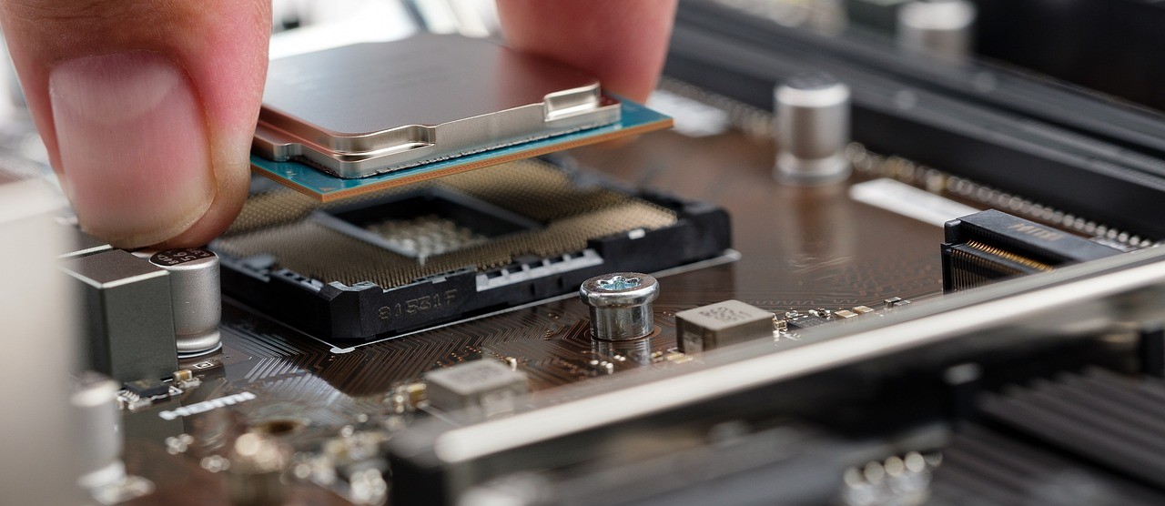 Which element is the basic material used in computer chips?