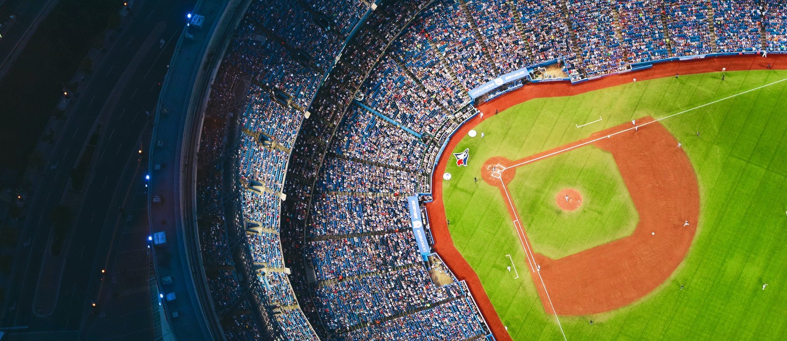 Which baseball team plays home games at the Rogers center?