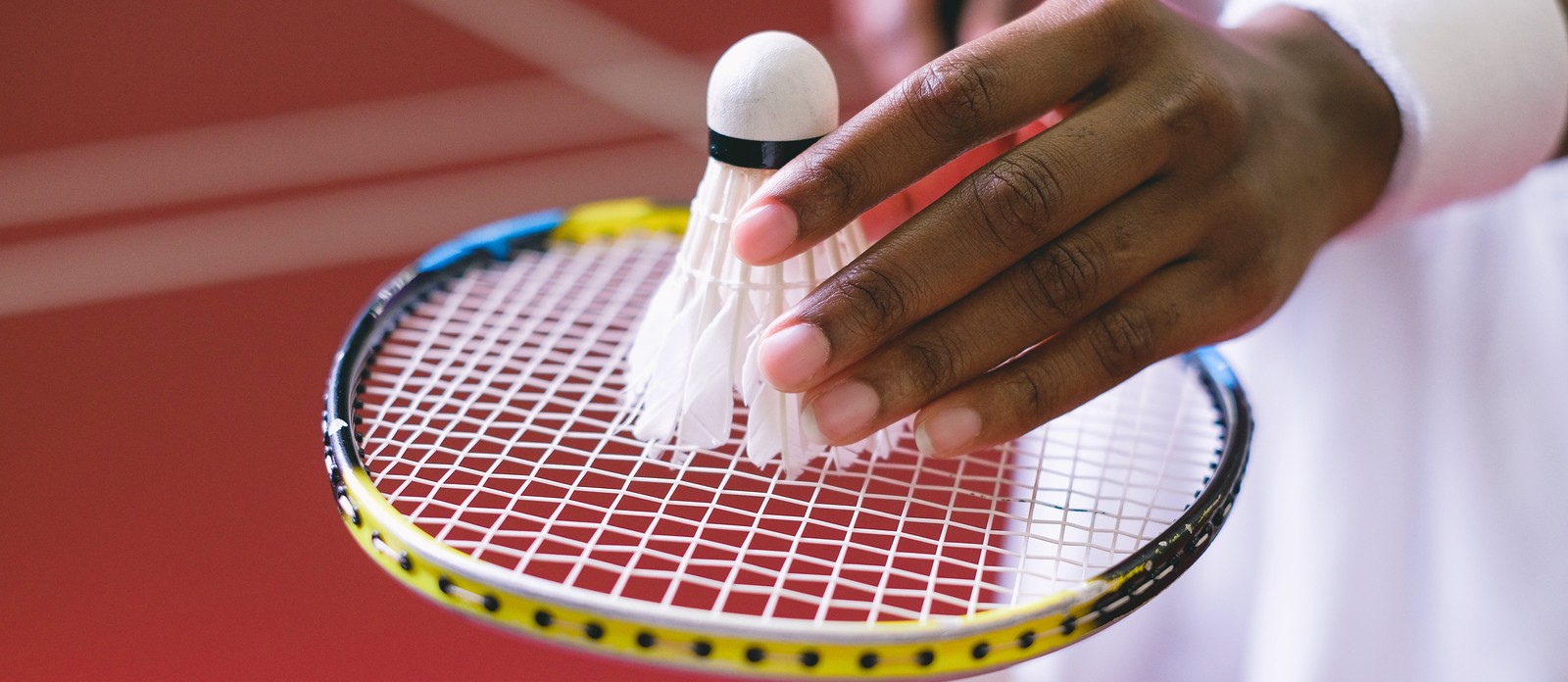 What is the name of the "ball" in badminton?