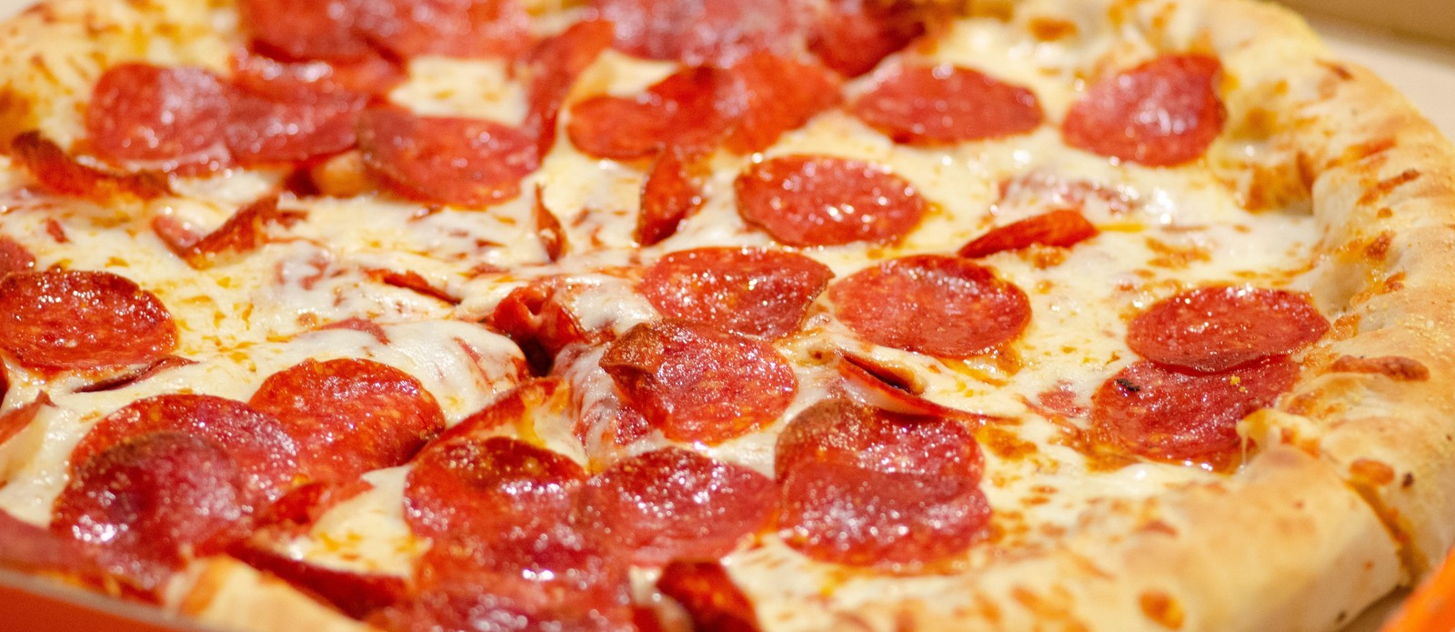Pepperoni was invented by what American immigrants?