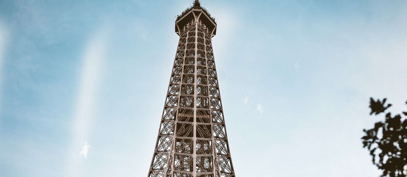 Which city has a replica of the Eiffel Tower taller than the original?