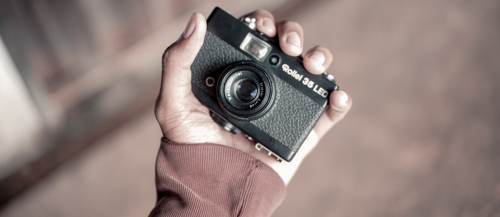 What was the name of the first successful rollfilm hand camera?